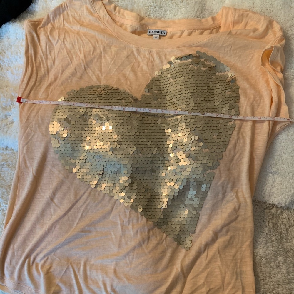 Express top with sequin heart